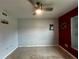 Neutral colored bedroom featuring a ceiling fan, and clean flooring at 1405 Dorchester St, Port Charlotte, FL 33952