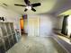 Bedroom with a ceiling fan, window seat and access to closet for storage at 1405 Dorchester St, Port Charlotte, FL 33952