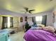 Cozy bedroom with ceiling fan, natural light, and potential for personalization at 1405 Dorchester St, Port Charlotte, FL 33952