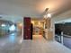 Open kitchen featuring tile floors, light wood cabinets, and modern appliances at 1405 Dorchester St, Port Charlotte, FL 33952