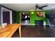 Open concept living area with tile flooring, and sliding door access to an outside patio at 1405 Dorchester St, Port Charlotte, FL 33952