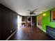 Spacious living room with ceiling fan and sliding glass doors to the yard at 1405 Dorchester St, Port Charlotte, FL 33952