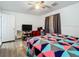 Bedroom with ceiling fan and hardwood floors at 8495 Cristobal Ave, North Port, FL 34287