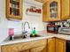 Kitchen boasts wood cabinets and ample counter space at 8495 Cristobal Ave, North Port, FL 34287