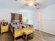 Bedroom with ceiling fan and yellow sleigh bed at 8495 Cristobal Ave, North Port, FL 34287