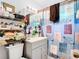 Clean bathroom with shower/tub combo and storage at 8495 Cristobal Ave, North Port, FL 34287