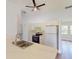 Open concept kitchen with new appliances and an island at 20340 Zelda Ave, Port Charlotte, FL 33952