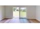 Bright living room with sliding glass doors and access to patio at 20340 Zelda Ave, Port Charlotte, FL 33952