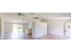 Open concept living and kitchen area with light flooring and modern design at 20340 Zelda Ave, Port Charlotte, FL 33952