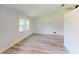 Spacious living room with light flooring, high ceilings, and ample natural light at 20340 Zelda Ave, Port Charlotte, FL 33952