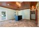 Light-filled dining area with wood ceiling and stylish light fixture at 8516 Riverside Dr, Punta Gorda, FL 33982