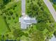 Aerial view showcasing the home's layout and surrounding landscape at 8516 Riverside Dr, Punta Gorda, FL 33982