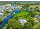 Aerial view showcasing the property's waterfront location and surrounding area at 8516 Riverside Dr, Punta Gorda, FL 33982