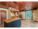 Modern kitchen featuring wood cabinets and a spacious island at 8516 Riverside Dr, Punta Gorda, FL 33982