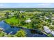 Spacious waterfront property with lush landscaping at 8516 Riverside Dr, Punta Gorda, FL 33982