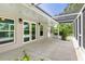 Screened patio with access to the interior of the home at 8516 Riverside Dr, Punta Gorda, FL 33982