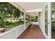 Bright and airy screened porch with tile flooring at 8516 Riverside Dr, Punta Gorda, FL 33982