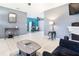 Open living room with views to dining area at 5104 Chaves Cir, Port Charlotte, FL 33948