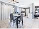 Kitchen with white cabinets, granite counters and appliances at 5104 Chaves Cir, Port Charlotte, FL 33948