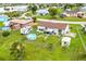 Backyard aerial view showing a home with a pool, shed, and patio at 5104 Chaves Cir, Port Charlotte, FL 33948