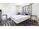 Bright bedroom with a double bed and wood-look flooring at 5104 Chaves Cir, Port Charlotte, FL 33948