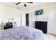 Bedroom with a double bed, dresser, and large TV at 5104 Chaves Cir, Port Charlotte, FL 33948