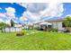 Spacious backyard with above-ground pool, patio, and camper at 5104 Chaves Cir, Port Charlotte, FL 33948