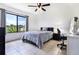 Bedroom with double bed, window, and workspace at 5104 Chaves Cir, Port Charlotte, FL 33948