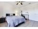 Cozy bedroom featuring a double bed, desk, and ample floor space at 5104 Chaves Cir, Port Charlotte, FL 33948