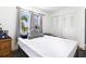 Bright bedroom with a double bed, window, and built-in closet at 5104 Chaves Cir, Port Charlotte, FL 33948