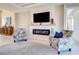Living room featuring a fireplace and comfortable seating at 2239 Cornelius Blvd, Port Charlotte, FL 33953