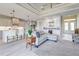 Open concept kitchen and living area with island at 2239 Cornelius Blvd, Port Charlotte, FL 33953