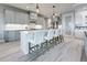 Modern kitchen featuring white cabinets, quartz countertops, and stainless steel appliances at 2239 Cornelius Blvd, Port Charlotte, FL 33953