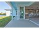 Covered patio with access to the kitchen and backyard at 2239 Cornelius Blvd, Port Charlotte, FL 33953