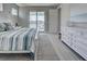 Main bedroom with water views, white dresser and king-size bed at 2239 Cornelius Blvd, Port Charlotte, FL 33953