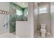 Bathroom with walk-in shower, toilet and modern vanity at 2239 Cornelius Blvd, Port Charlotte, FL 33953