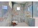 Large walk-in shower with marble-look tile at 2239 Cornelius Blvd, Port Charlotte, FL 33953