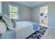 Bedroom with a queen-size bed and view into the bathroom at 2239 Cornelius Blvd, Port Charlotte, FL 33953