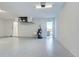 Bright and spacious garage with epoxy flooring and extra storage at 2239 Cornelius Blvd, Port Charlotte, FL 33953
