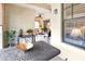 Outdoor patio with table and chairs, offering a view of the living room at 96 Vivante Blvd # 96211, Punta Gorda, FL 33950