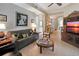 Spacious living room featuring a sofa, armchair, and coffee table at 96 Vivante Blvd # 96211, Punta Gorda, FL 33950