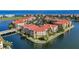 Aerial view of waterfront community with multiple buildings at 96 Vivante Blvd # 96211, Punta Gorda, FL 33950