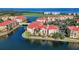 Waterfront property with multi-unit condo buildings and lush landscaping at 96 Vivante Blvd # 96211, Punta Gorda, FL 33950