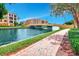 Brick-paved walkway with scenic canal views at 96 Vivante Blvd # 96211, Punta Gorda, FL 33950