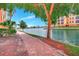 Brick walkway alongside a canal, offering scenic waterfront views at 96 Vivante Blvd # 96211, Punta Gorda, FL 33950