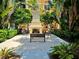 Relaxing outdoor fireplace area with seating at 96 Vivante Blvd # 96211, Punta Gorda, FL 33950