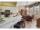 Modern kitchen with white cabinets and a breakfast nook at 96 Vivante Blvd # 96211, Punta Gorda, FL 33950