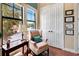 Bright office with a comfortable armchair and large windows at 96 Vivante Blvd # 96211, Punta Gorda, FL 33950