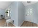 Inviting entryway featuring wood-look flooring and a decorative glass front door at 7456 Jennifer Dr, Port Charlotte, FL 33981