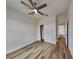 Light and airy bedroom with wood-look floors and a closet at 16216 Minorca Dr, Punta Gorda, FL 33955